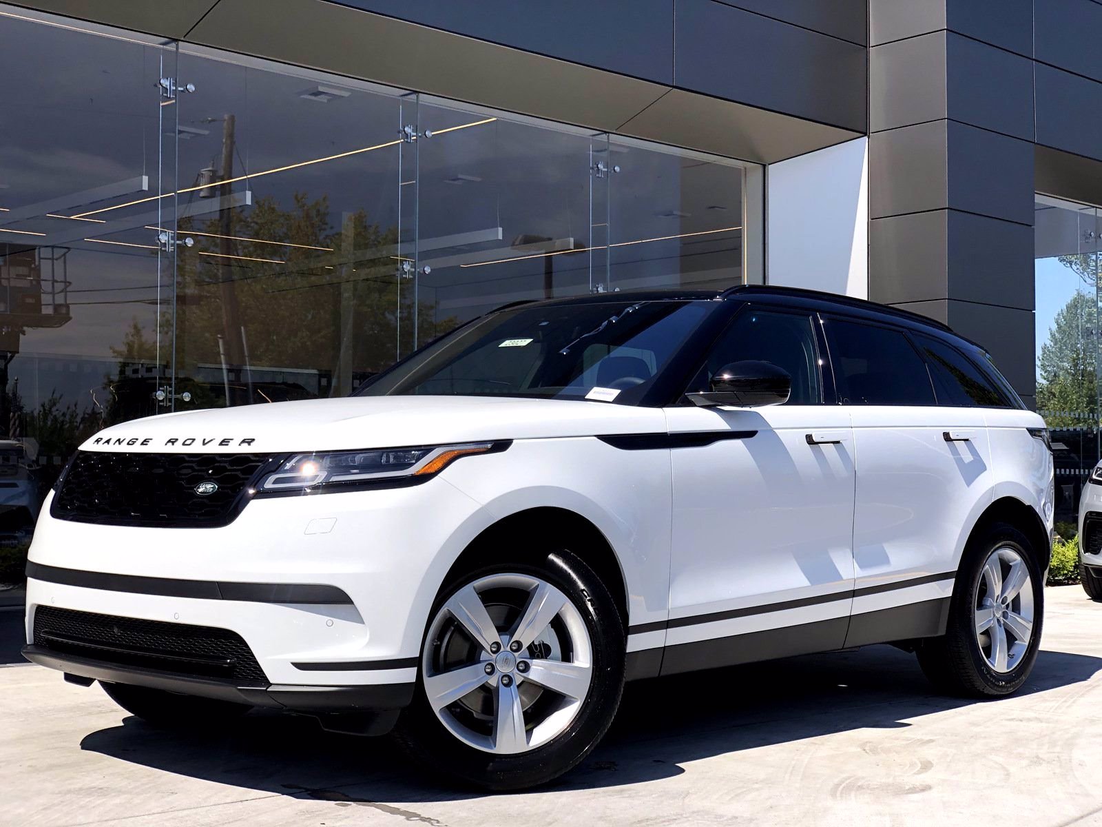 Range Rover Velar Or Sport  - Explore Its Advanced Driving Capabilities And Stunning Design In Detail.